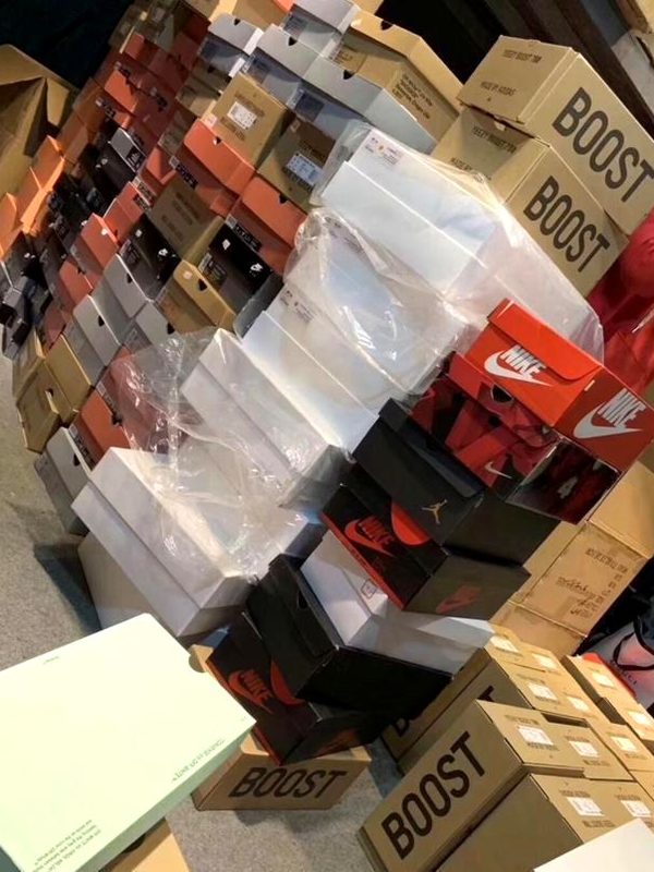Factory stock — multi-brand shoe box inventory including Yeezy BOOST, Nike, Air Jordan